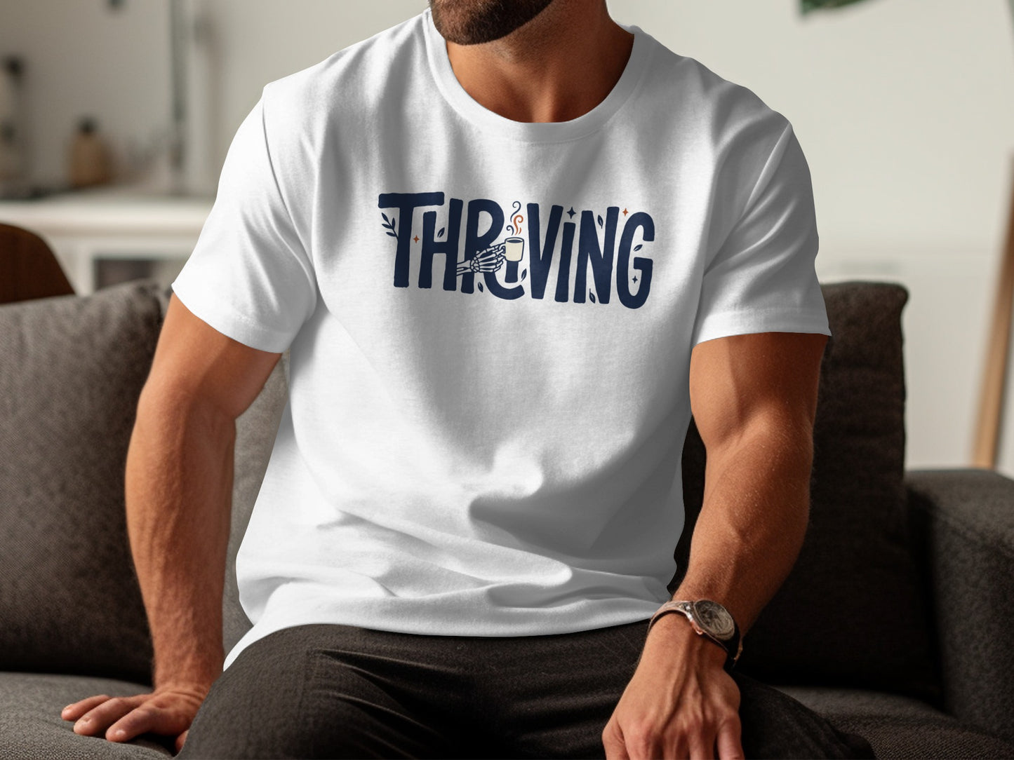 White t-shirt with blue text "THRIVING" and a coffee cup graphic.