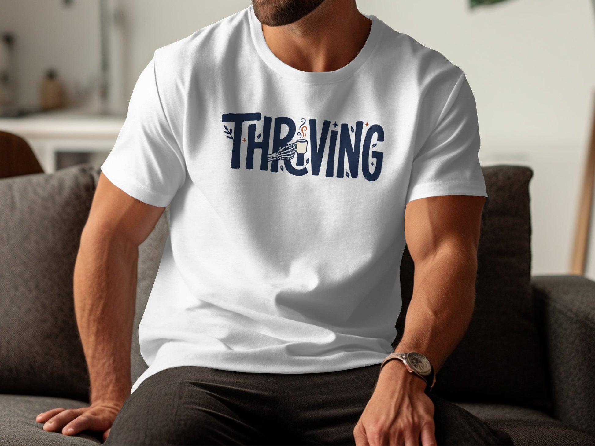 White t-shirt with blue text "THRIVING" and a coffee cup graphic.